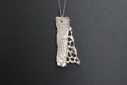 Jewellery worked in bobbin lace and Art Clay in silver